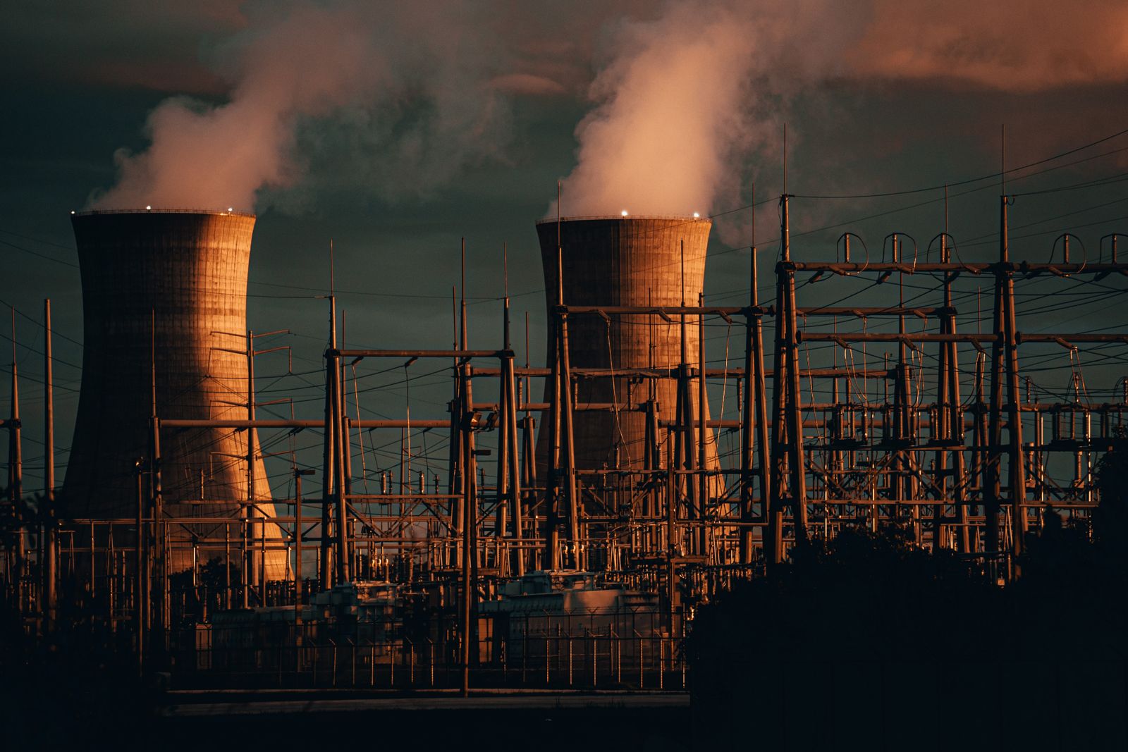 Cooling towers with steam at dusk